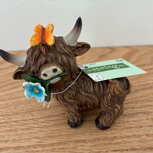 The Spring Shop Brown Cow Figurine with Orange Butterfly and Blue Flower